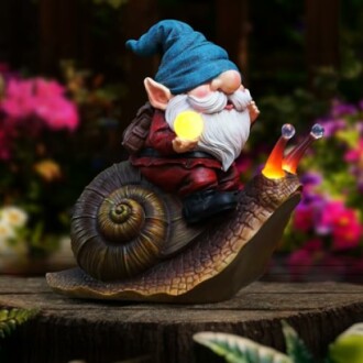 Charming garden gnome statue illuminating an outdoor space.