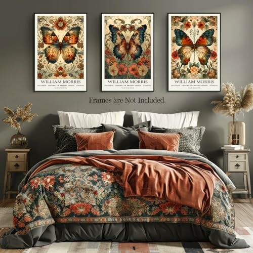 Bohemian bedroom with butterfly art prints above bed.