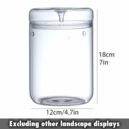 Clear glass storage jar with lid, 18cm tall and 12cm wide.