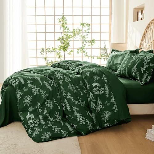 Green botanical bedding set with floral patterns in a bright room.