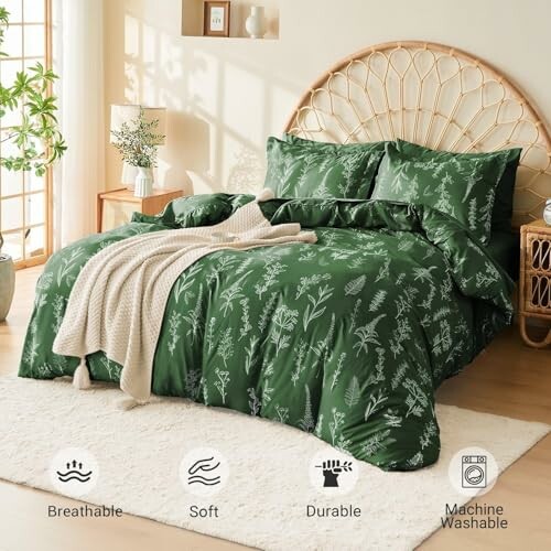 Green floral bedding set in a sunlit bedroom with decorative pillows and a throw blanket.