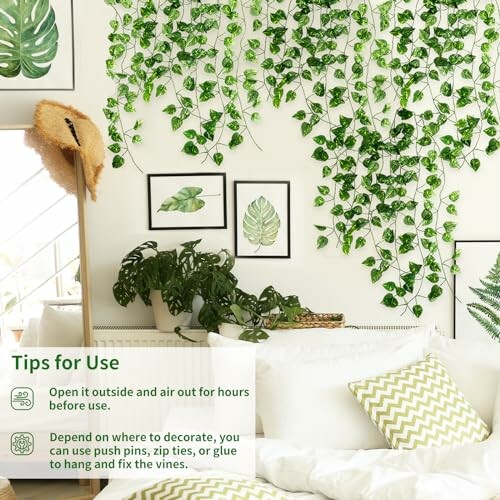 Bedroom with hanging vine decor and framed leaf art.