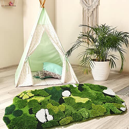 Kids' play tent with green patterned rug and indoor plant.