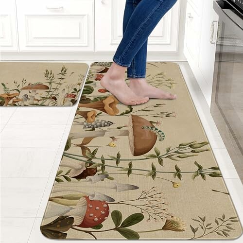 Person standing on kitchen rug with mushroom pattern.