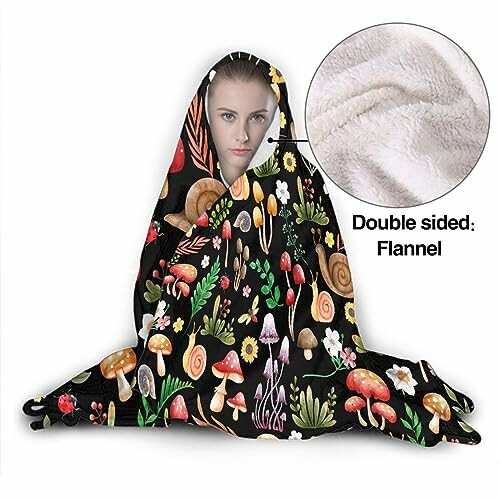 Person wearing a hooded blanket with colorful mushroom pattern, double-sided flannel.