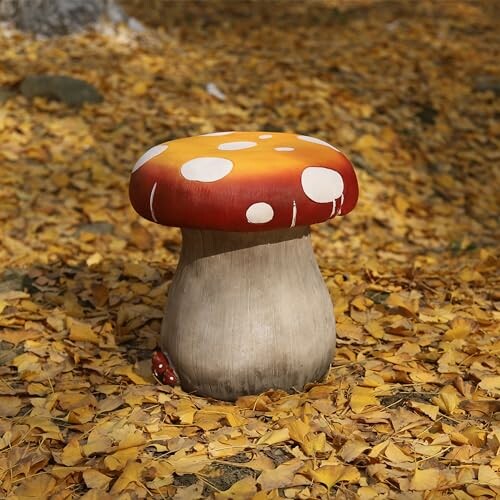 Mushroom sculpture on fallen autumn leaves